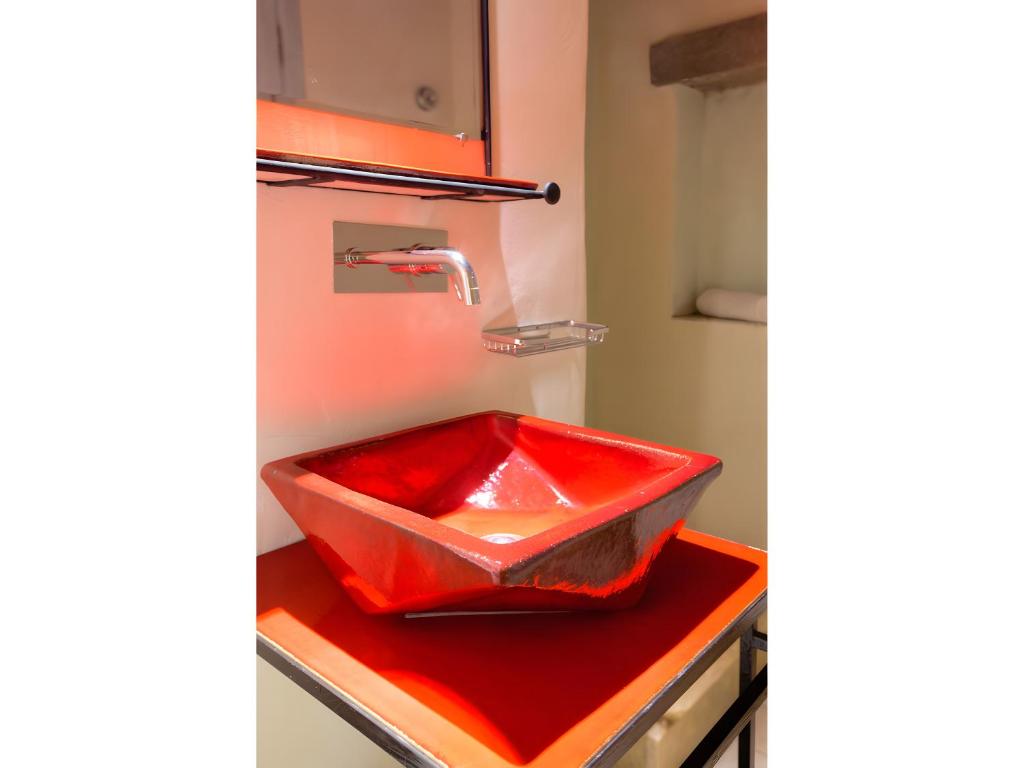 Kuchyň nebo kuchyňský kout v ubytování Santanna Suites
