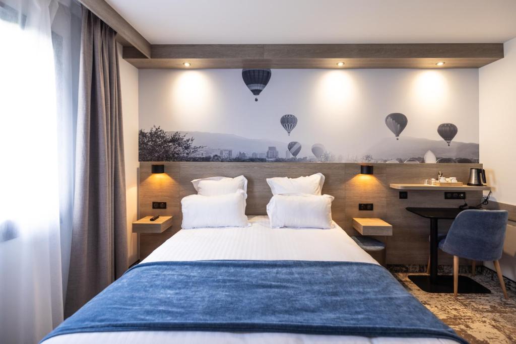 Postel nebo postele na pokoji v ubytování Best Western Saint Exupéry Eysines - Bordeaux Ouest