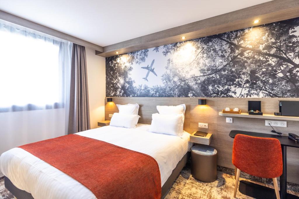 Postel nebo postele na pokoji v ubytování Best Western Saint Exupéry Eysines - Bordeaux Ouest