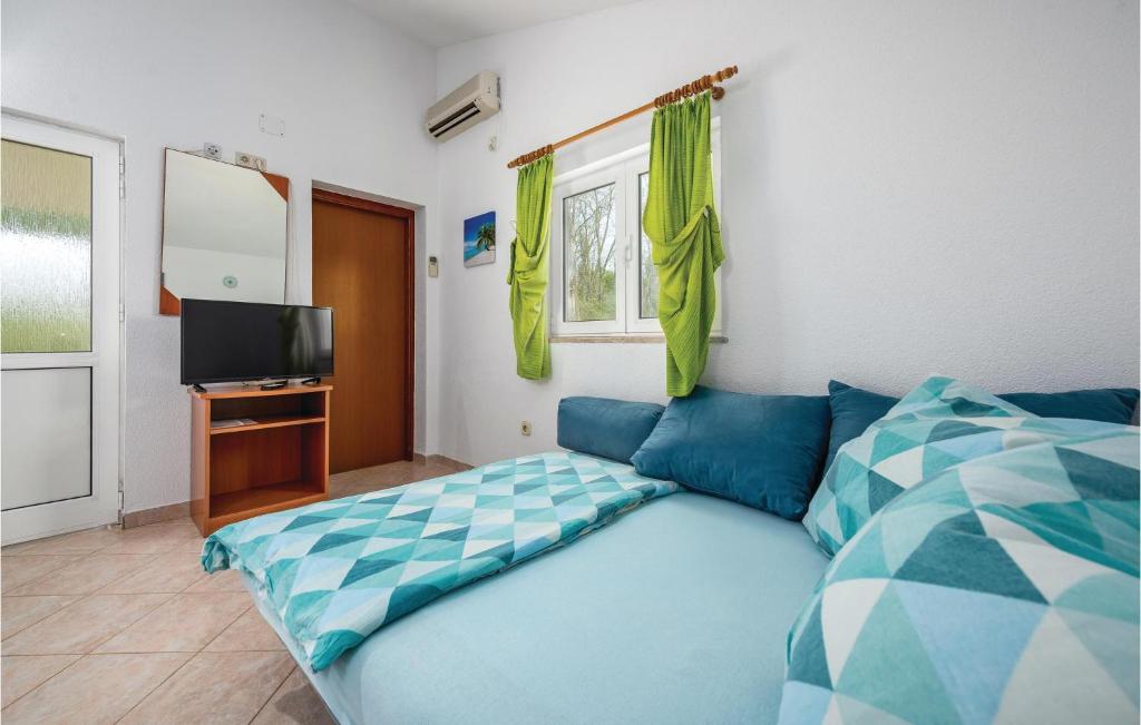 Łóżko lub łóżka w pokoju w obiekcie Studio Apartment In Sv,lovrec