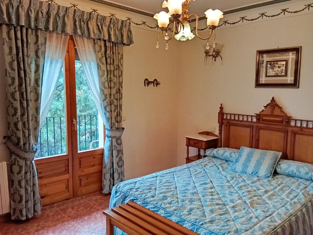 Postel nebo postele na pokoji v ubytování Hotel La Rueda 3000