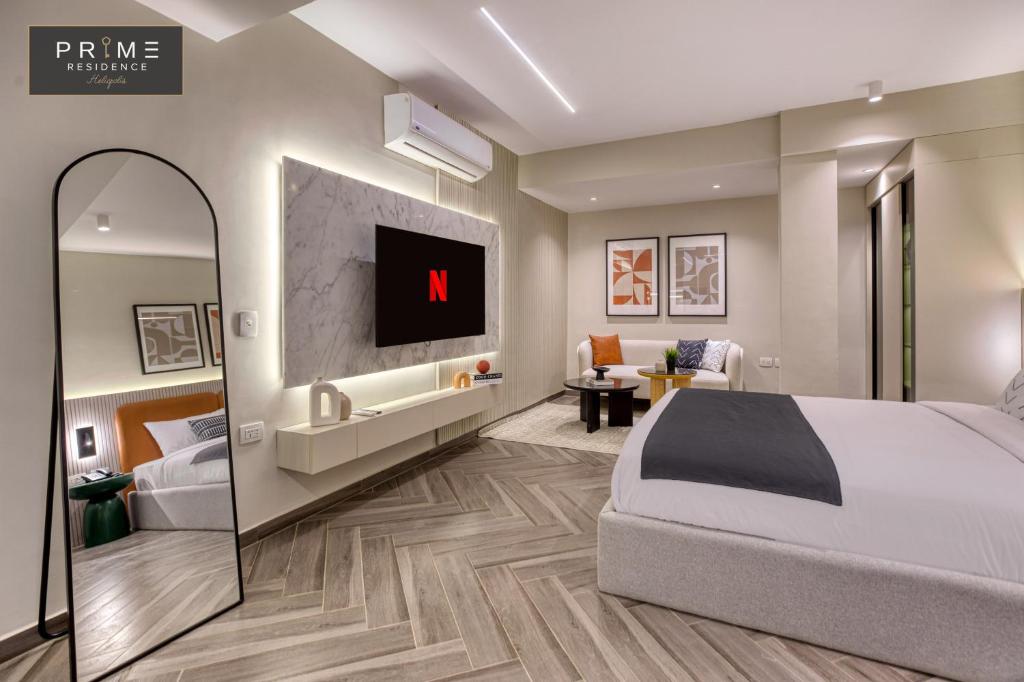Ένα ή περισσότερα κρεβάτια σε δωμάτιο στο Prime Residence Heliopolis