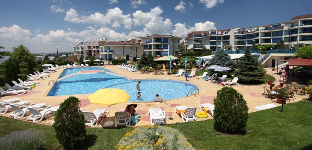 The swimming pool at or close to Holiday Apartment in Riviera Complex