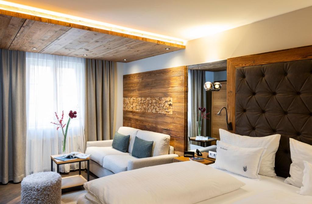 Posteľ alebo postele v izbe v ubytovaní Hotel Innsbruck
