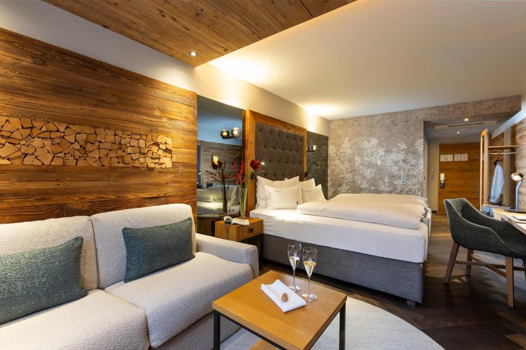 Posteľ alebo postele v izbe v ubytovaní Hotel Innsbruck