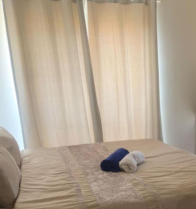 a stuffed animal is laying on a bed at Southampton Central Pad in Southampton