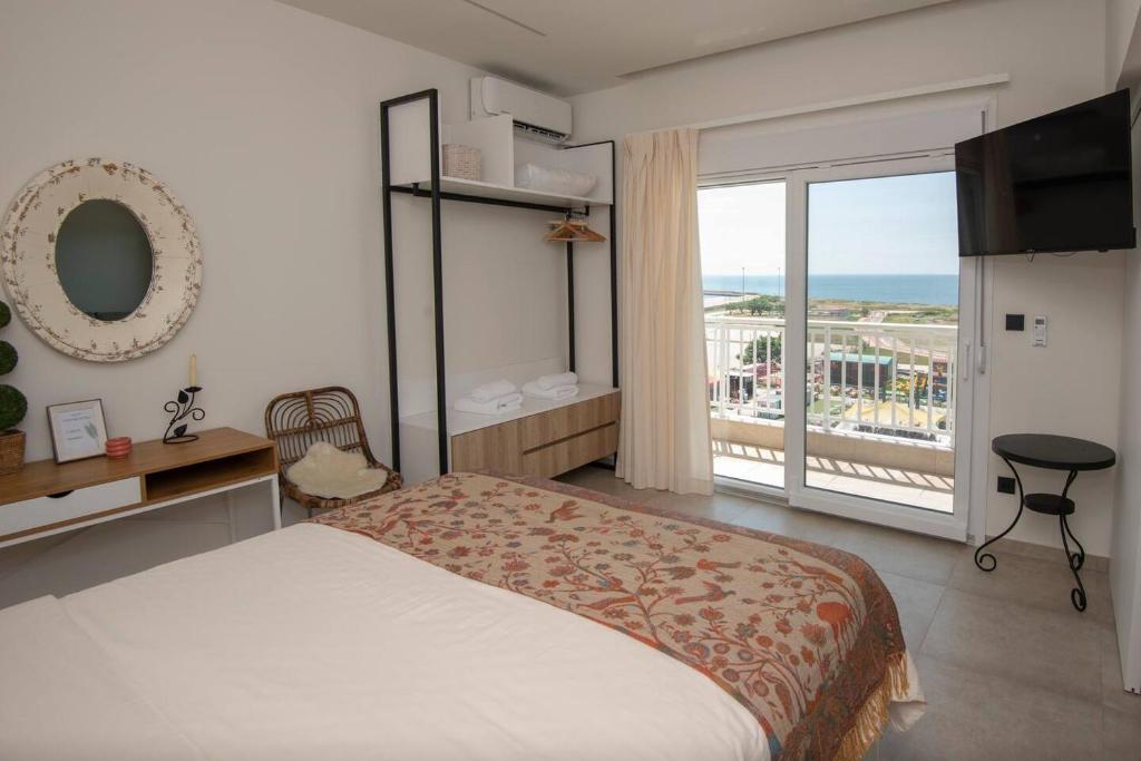 Posteľ alebo postele v izbe v ubytovaní Lighthouse Apartments