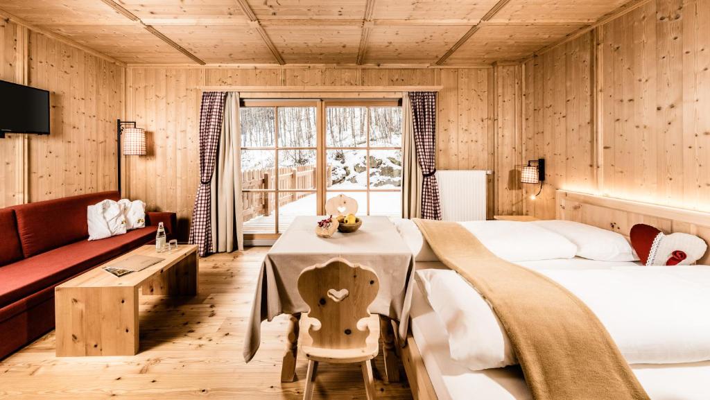 Postel nebo postele na pokoji v ubytování Hotel Oberraindlhof