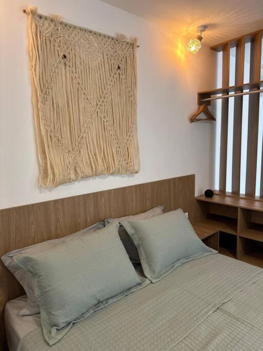 Postel nebo postele na pokoji v ubytování Villa Naluri - Studio A001 no paraíso Japaratinga!