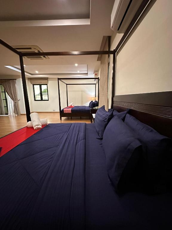 Postel nebo postele na pokoji v ubytování Maxwell inn