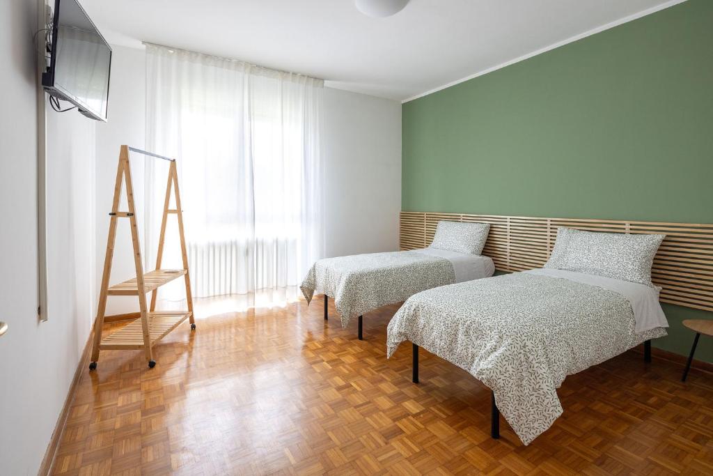 Postel nebo postele na pokoji v ubytování Casa Genny