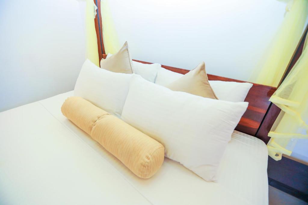 Postel nebo postele na pokoji v ubytování Mel's Inn