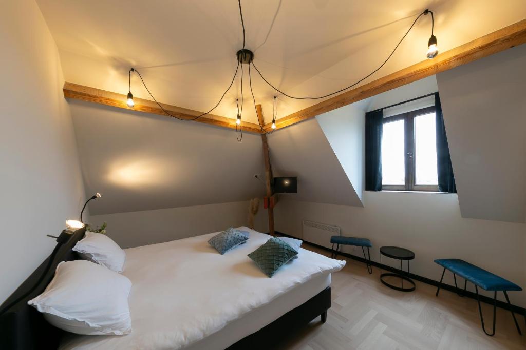 Postel nebo postele na pokoji v ubytování 't Convent