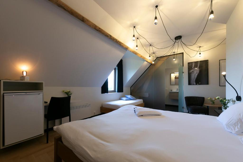 Postel nebo postele na pokoji v ubytování 't Convent