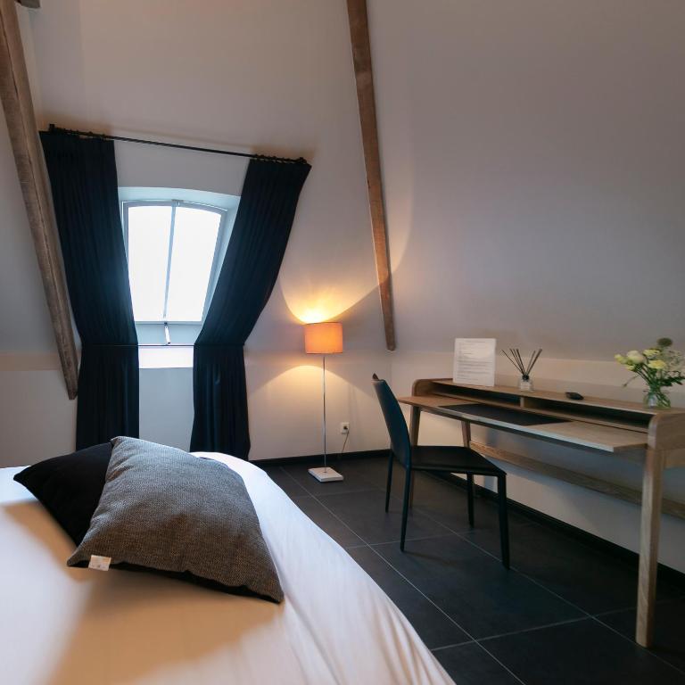 Postel nebo postele na pokoji v ubytování 't Convent