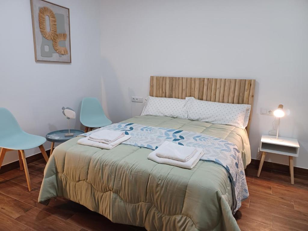 Ένα ή περισσότερα κρεβάτια σε δωμάτιο στο El Refugio de Brovales