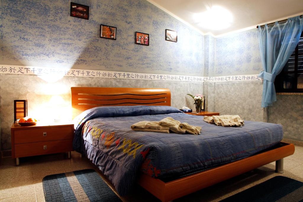 Postel nebo postele na pokoji v ubytování Hotel Food & Drink