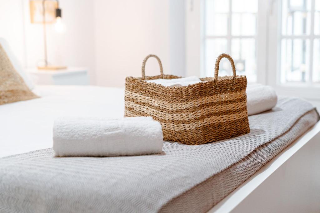 Cama o camas de una habitación en El Mirador De La Consentida Rooms & Suites Boutique