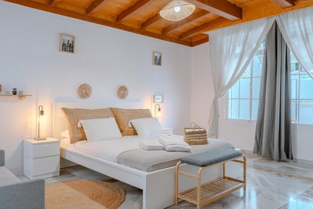 Cama o camas de una habitación en El Mirador De La Consentida Rooms & Suites Boutique