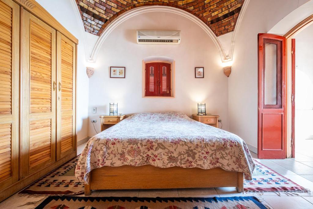 Postel nebo postele na pokoji v ubytování villa al diwan luxor
