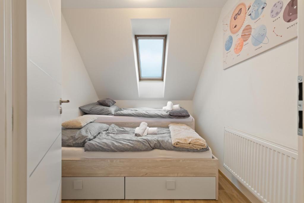 Postel nebo postele na pokoji v ubytování Home Dalov