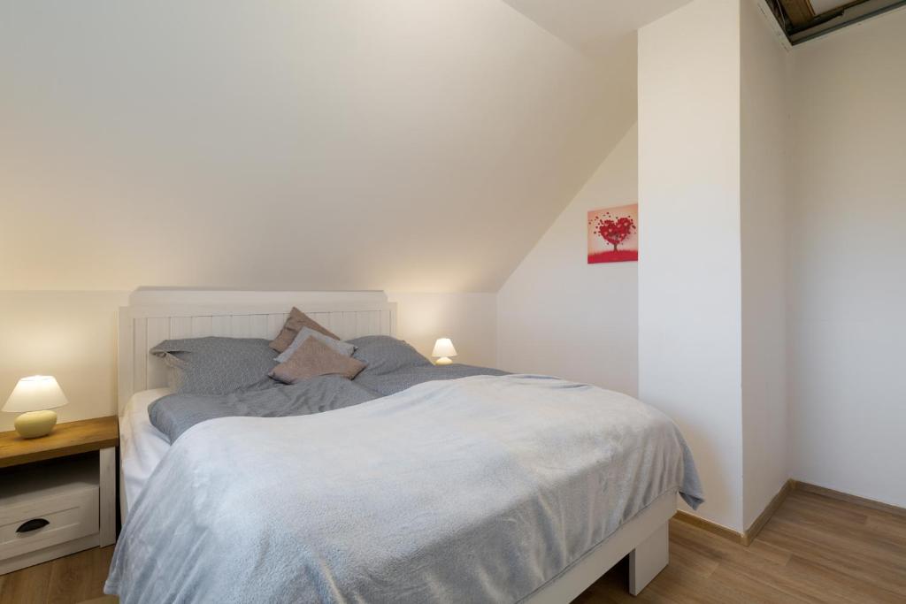 Postel nebo postele na pokoji v ubytování Home Dalov