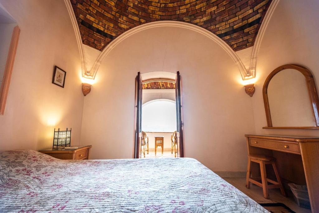 Postel nebo postele na pokoji v ubytování villa al diwan luxor