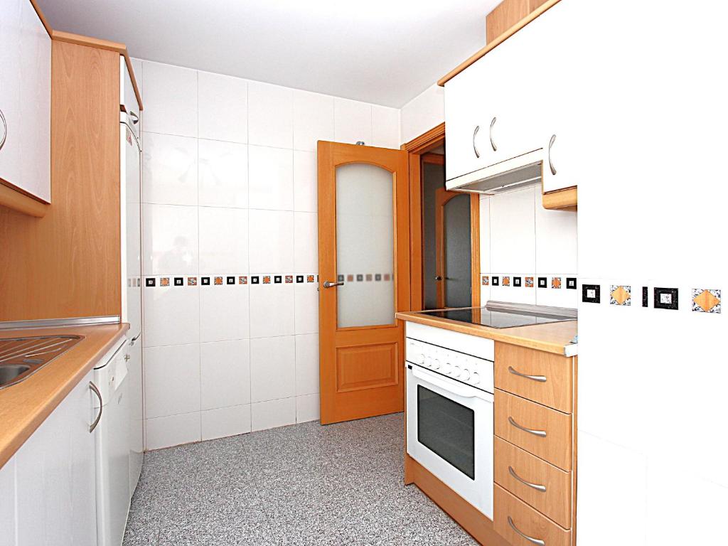 Kuchyň nebo kuchyňský kout v ubytování Luxury Apartment Holiday Rental Ne