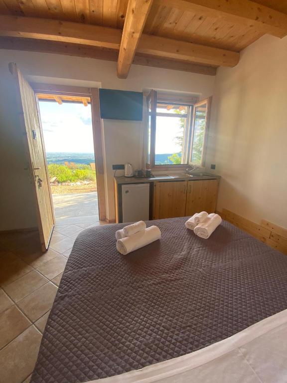 Postel nebo postele na pokoji v ubytování Agriturismo La Perlara - Adults Only
