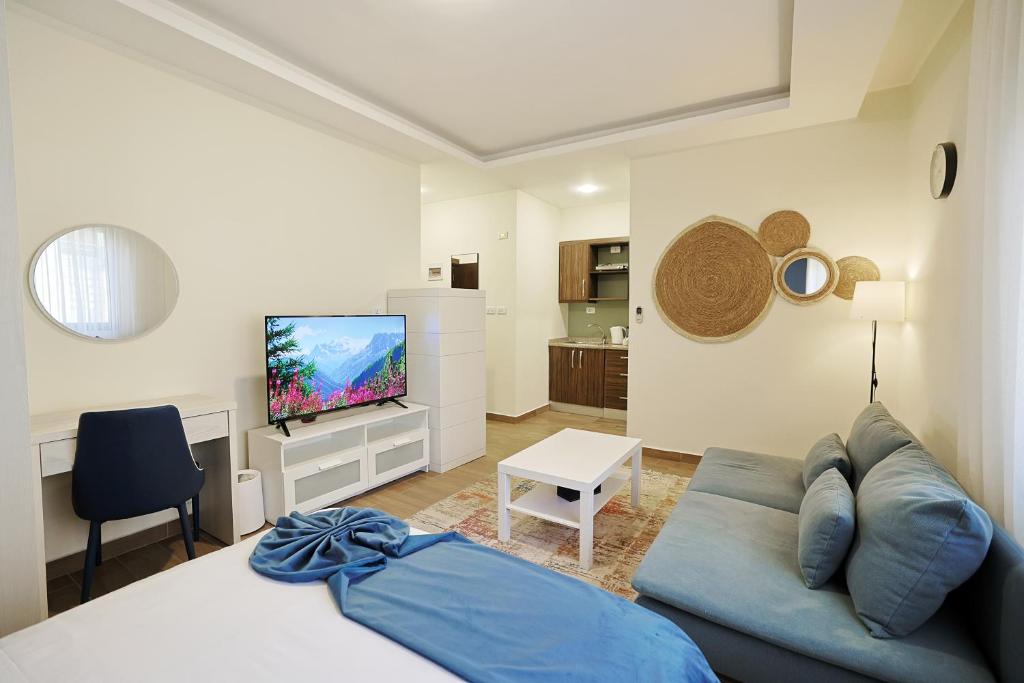 TV a/nebo společenská místnost v ubytování 46 Serviced Apartments