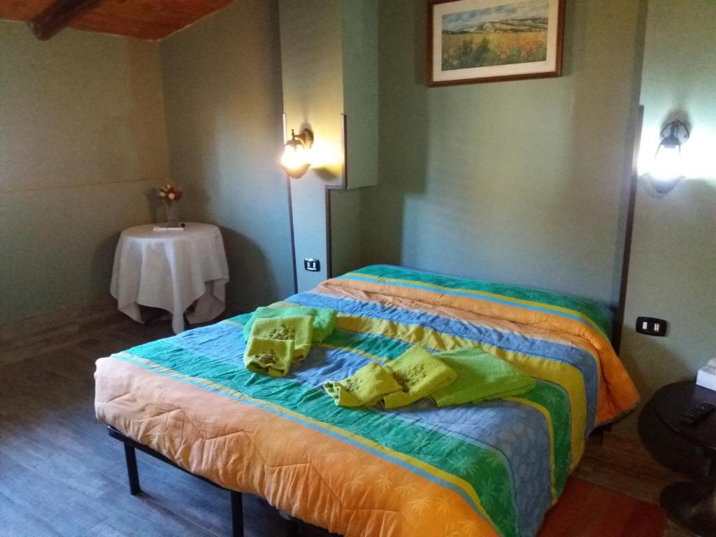 Postel nebo postele na pokoji v ubytování Hotel Food & Drink
