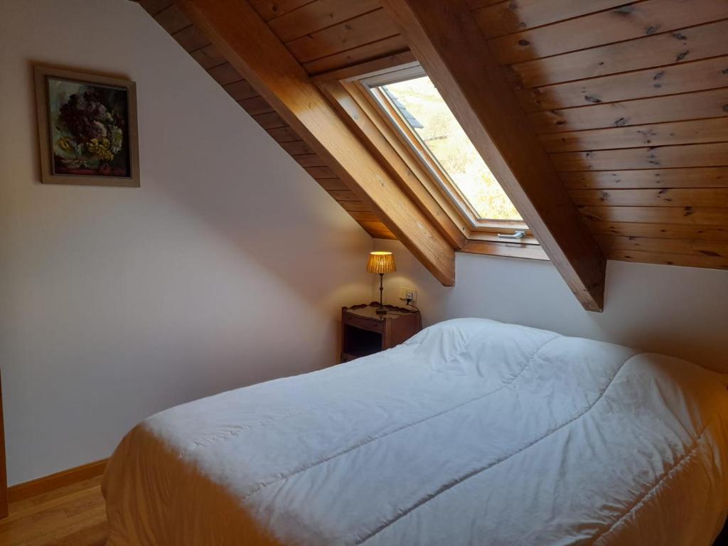 Posteľ alebo postele v izbe v ubytovaní Dúplex con moderna y amplia cocina Erta 6