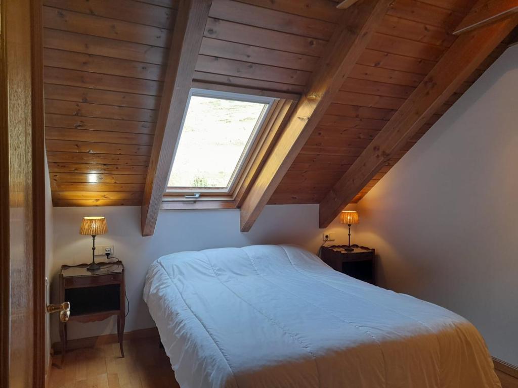 Posteľ alebo postele v izbe v ubytovaní Dúplex con moderna y amplia cocina Erta 6