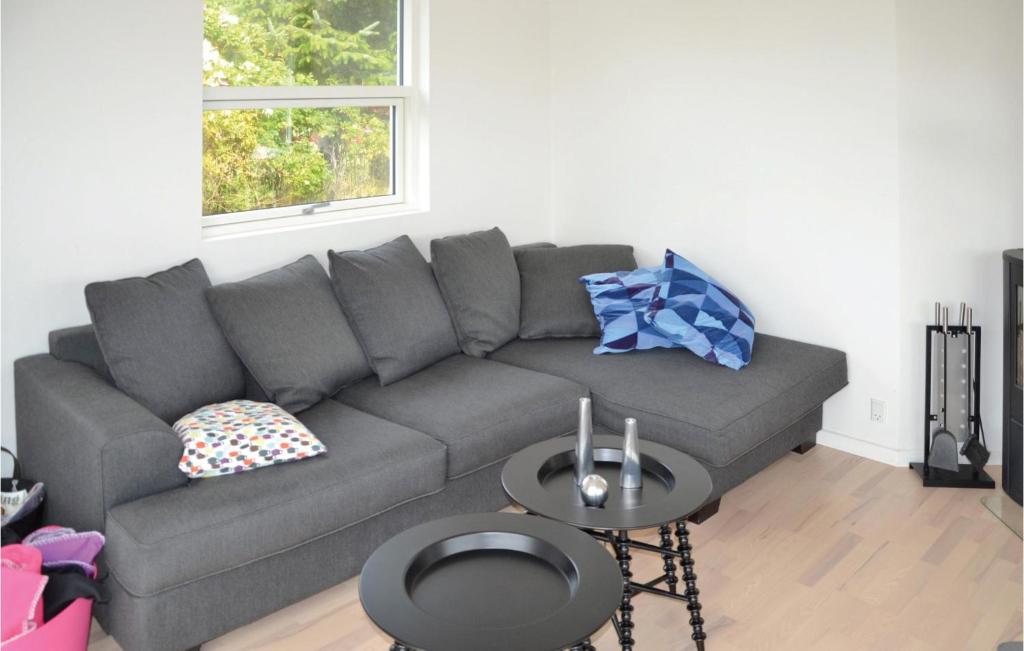 Posezení v ubytování Holiday Home Fasanvej Løkken V