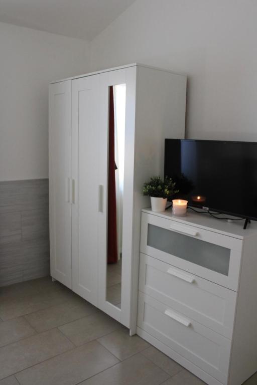 TV a/nebo společenská místnost v ubytování Elena House Castelluccio