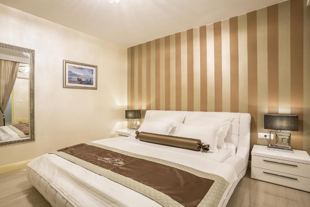 Postel nebo postele na pokoji v ubytování Guest House Benedict