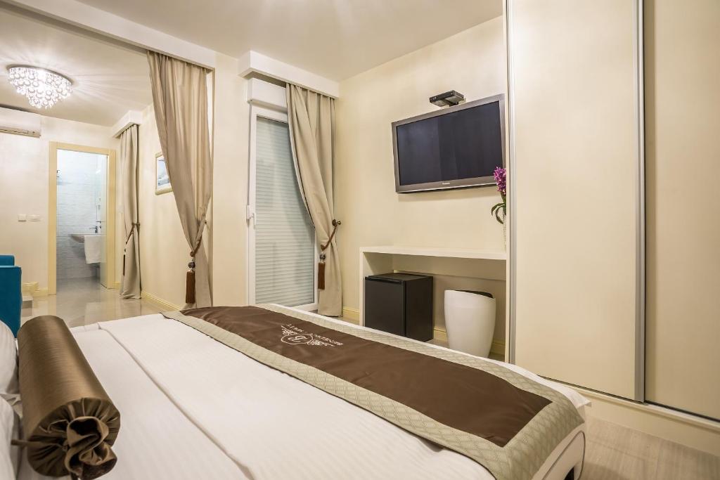TV a/nebo společenská místnost v ubytování Guest House Benedict