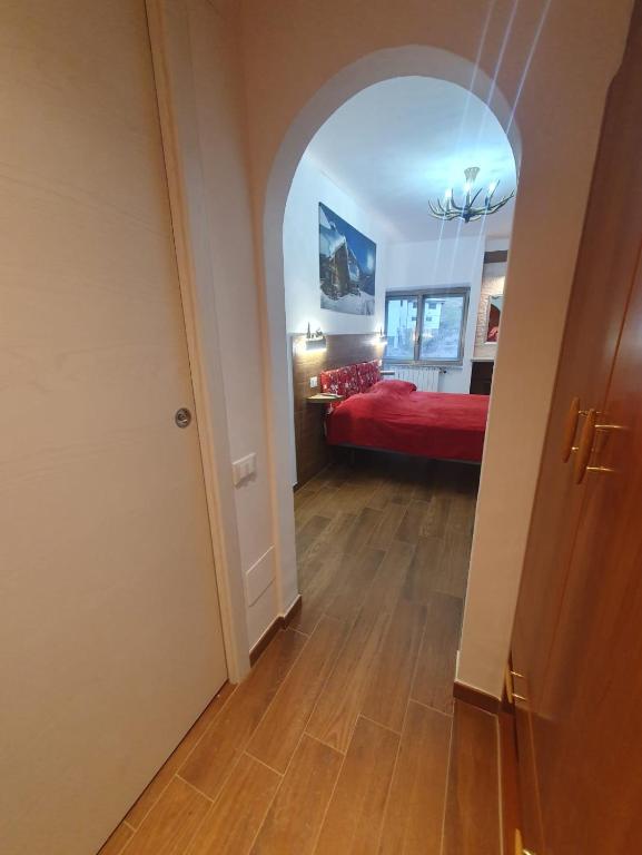 Postel nebo postele na pokoji v ubytování Il RIFUGIO DELLO SCIATORE RESIDENCE PARADISO