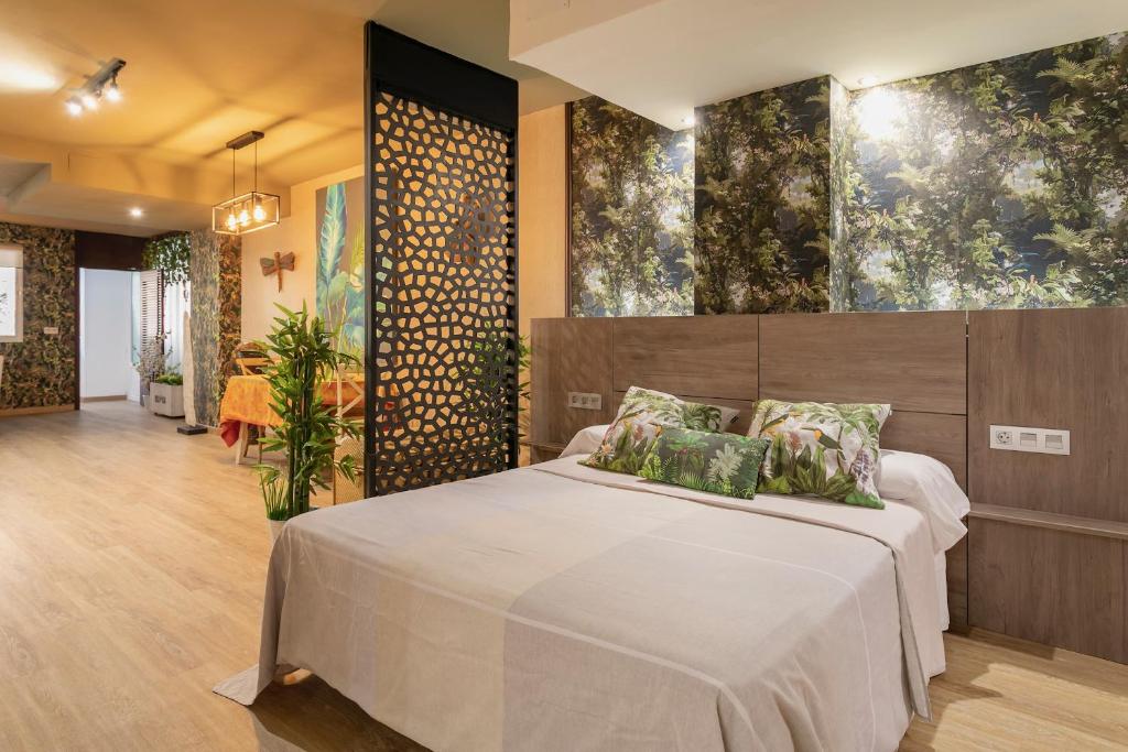 Postel nebo postele na pokoji v ubytování Tropical Loft