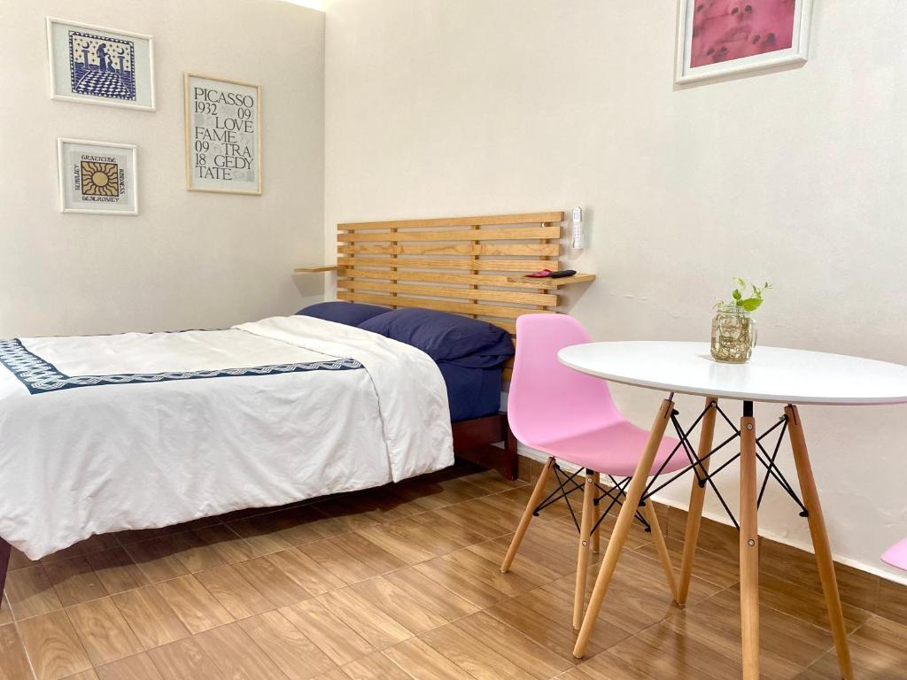 Postel nebo postele na pokoji v ubytování Loft en Veracruz