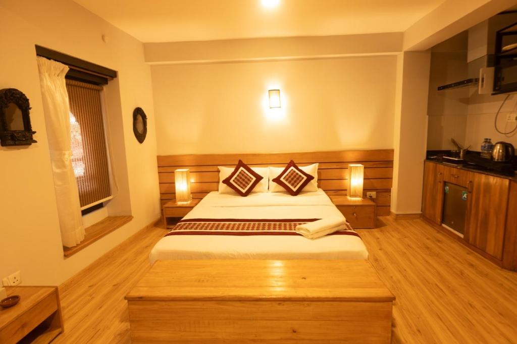 Postel nebo postele na pokoji v ubytování Subha Casa Hotel