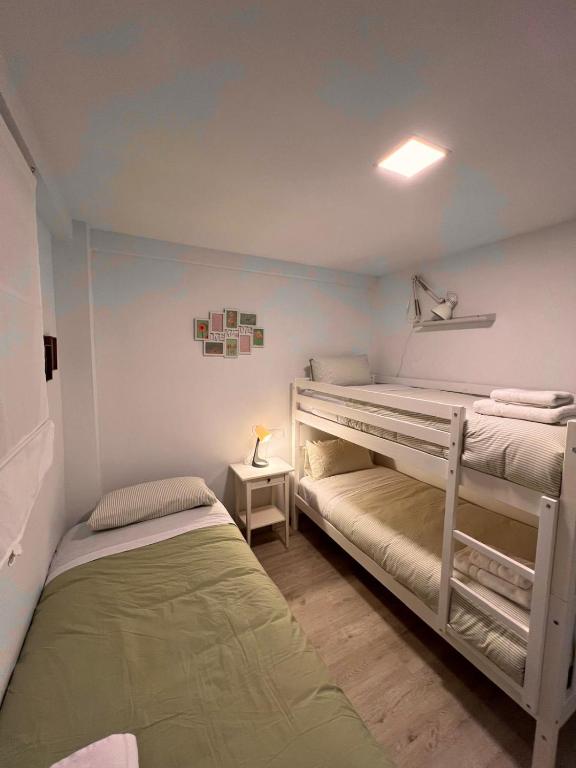 Postel nebo postele na pokoji v ubytování La Terracita especial grupos Z02soh