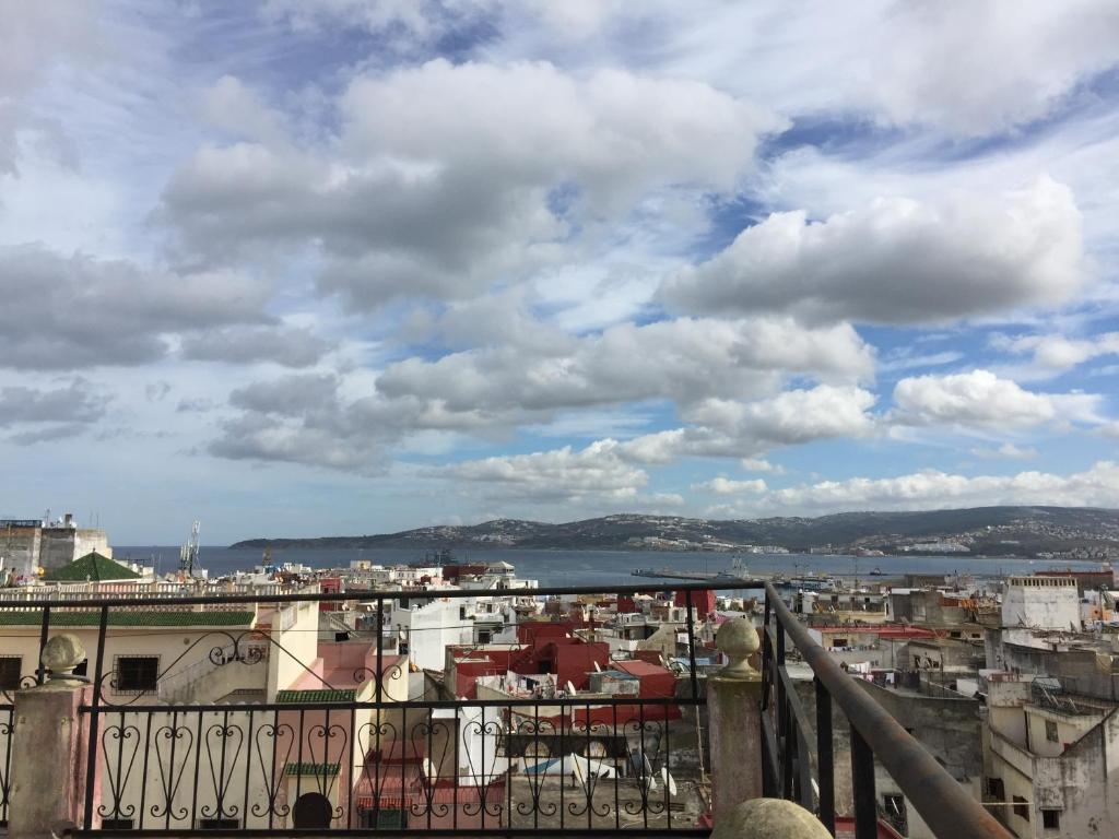 a view of a city from a balcony at Dar Tanger Medina in Tangier