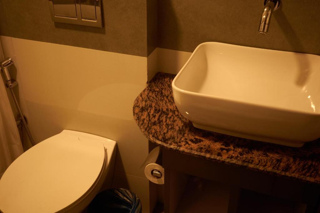 Koupelna v ubytování Subha Casa Hotel