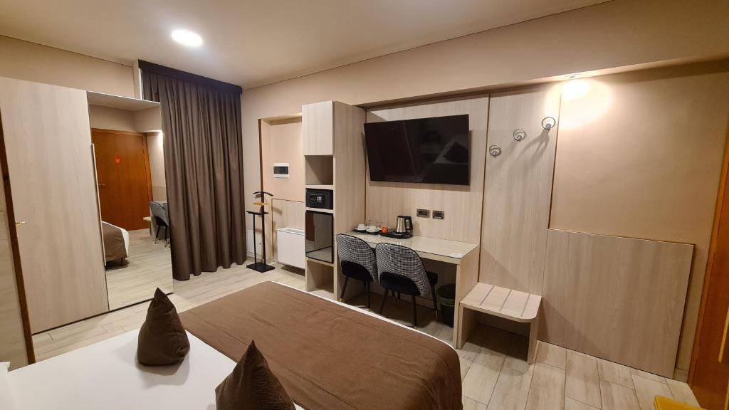 TV a/nebo společenská místnost v ubytování Hotel Lenotel