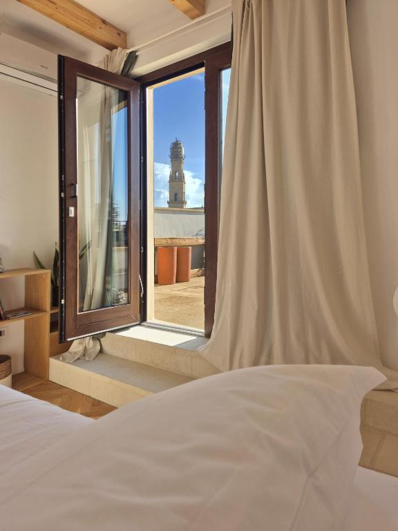 Postel nebo postele na pokoji v ubytování Suite Torre San Giorgio