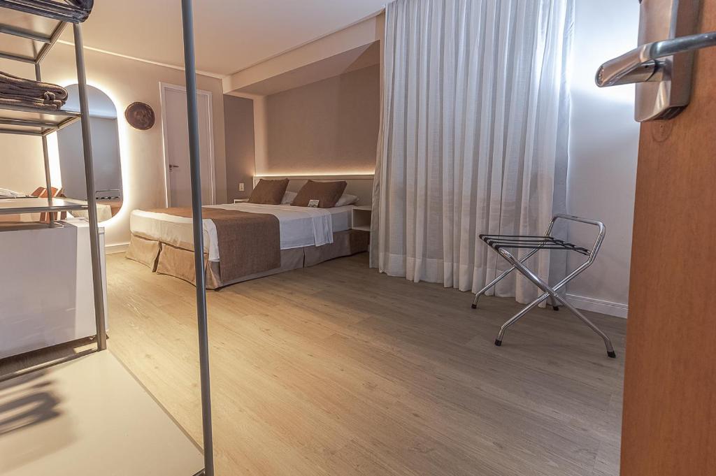 Cama ou camas em um quarto em Littoral Express