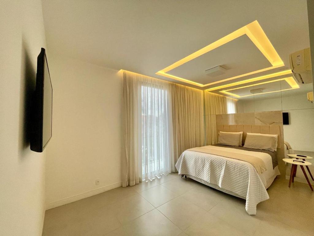 Postel nebo postele na pokoji v ubytování Casa em Camboinhas a 150m da praia