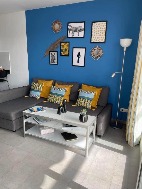 A seating area at MOGAN PEARL - POOL - DOUBLE TERRACE - OCEAN VIEW - BEACH - WIFI - WONDERFUL Complex - FREE DIGITAL TRAVEL GUIDE