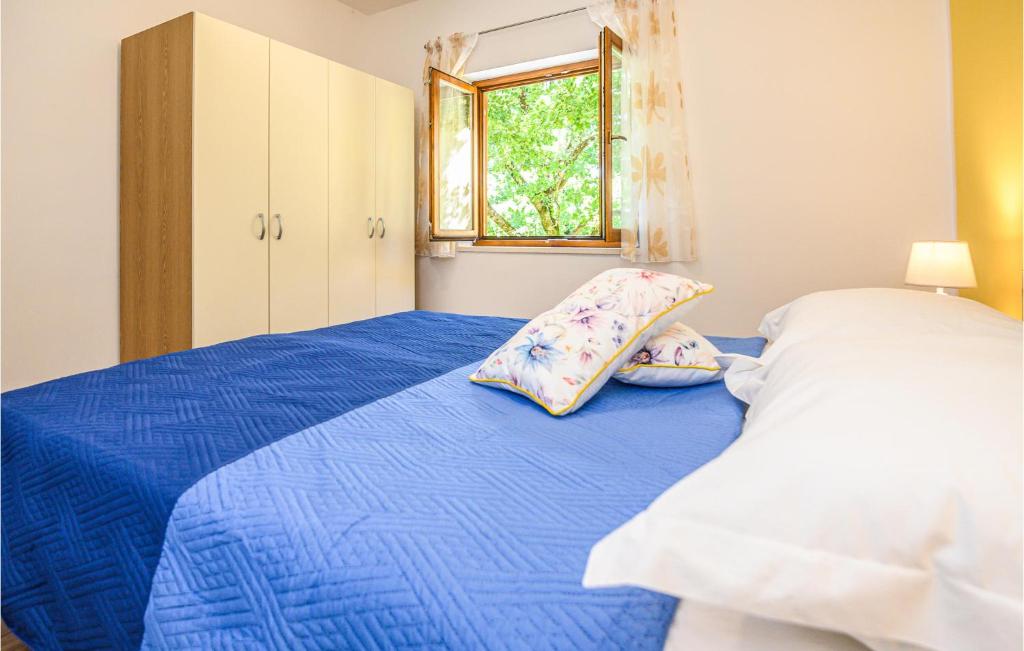 Posteľ alebo postele v izbe v ubytovaní Stunning Home In Dicmo With Kitchen